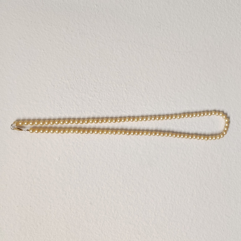 Beautiful Cream Colored Faux Pearl Necklace. 32 Inches